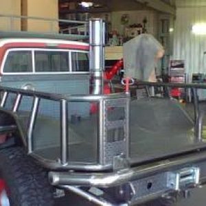 79 Dodge D200 with a 5.9 Cummins, built trans, pneumatic switches for the twin stick, built 60's-geared for 41's with Air Lockers FF/RR.  Huge build s