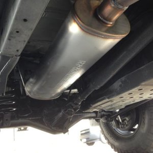 Magnaflow muffler PN# 12286 24"x8"x5", 2.5" centered inlet / 2.5" offset outlet. The sound is just right, not too loud, not too quiet!