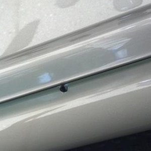 Bullet hole drivers side front door