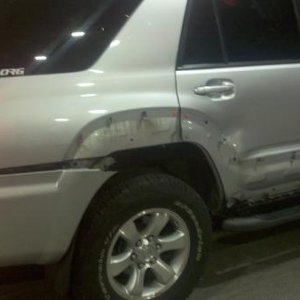 Silly Doe ran into the side of my Runner... tore the bumper, lost the two body side moldings, and put a nice sized dent in the pass rear door. the den