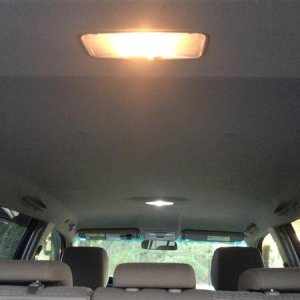 New in front before I installed the larger truck light in front dome. BIG difference! This picture doesn't do it justice.