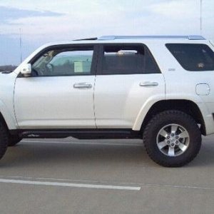 Working on eliminating the rear sag from Tire Carrier, any suggestions?  Have the ToyTech Premium lift. I was thinking about going with larger 10k bum