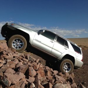 Playin in the rocks, and I would have climbed to the top but it was to narrow for my fat girl!