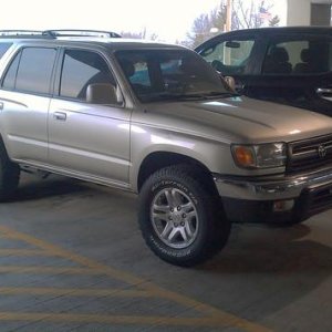 TUNDRA rims, BFG 265/70/17's, painted grille, front tint, NGK wires, Mobil 1, intake reducer off. SR5 flares coming soon.
