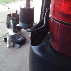 Custom recycled (rescued from the trash) bracket.