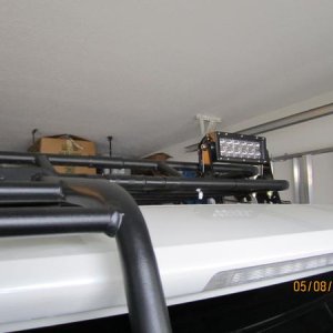 Double row 7.5 in LED light bar as my back up light. Someone had to put limo tint over the factory tint... : )