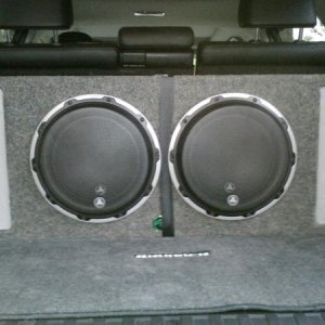 This is a "Brand New" sub that I purchased a couple of months ago. The cab is made by "Audio Enhancers" and is a driver specific enclosure; not a gene