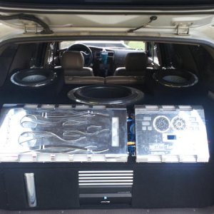 1 High Current 2400watt Audiobahn Amp for 2 2006 model FlameQ 12" Subs , plus 1   2007 1200watt Amp for  1  18" Ultra Excursion Sub,  3 boxs with 4 po