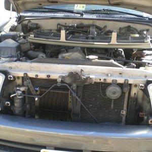 Tranny cooler mod and the grille resting on top of my squirrel cage of a four-banger.