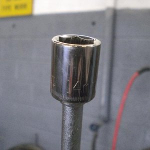 14 mm socket to remove the drain plug on the trans. oil pan.