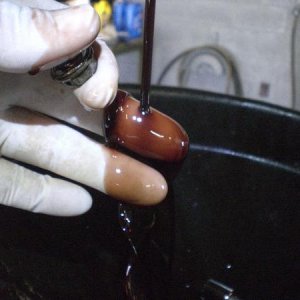 The color of the fluid on my white latex-gloved hand.