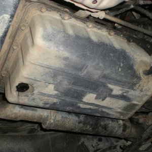 Prior to removing the pan.
