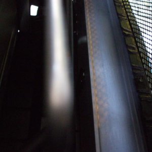 Prepared the support beam behind the bottom grille by covering it with carbon fiber tape.