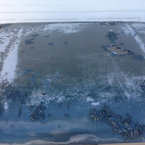 Stripping the paint from the new green hood