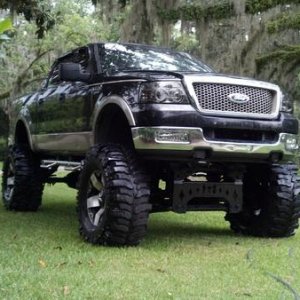 IMG 20130805 193538 108
My mans truck total of 21 inches of lift on 44 boggers and 20inch rockstars... Svt motor....