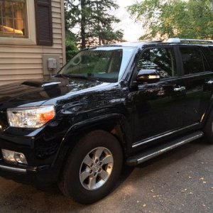 so far on the upgrades are trail hood and TRD stickers on the back fender. step boards too.. I'm thinking they have to go though.