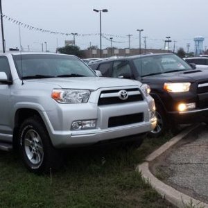 the gray one was my first one. I bought that one and traded it on a 2012 tundra.. then I missed the runner so much that i traded the tundra in and got