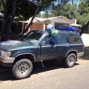 came with truxxx mt's i believe is the name, completely bald, replaced with 31x10.5x15 firestone at's. not great, but does the job.