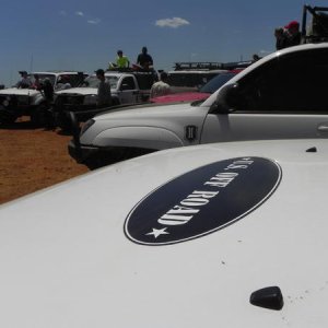 Getting lined up for the group photo next to Demello's 4Runner.