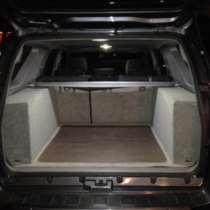 Finished product! Completely covered in carpeting, including the interior. I notched out a squre off the bottom piece in the back for the cargo net at