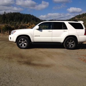 Bone stock, factory: nav, tint, power everything, sunroof, dhac, trac control, center lockers, tow package.  Your average run of the mill limited. The
