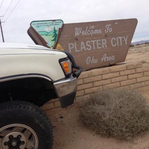 flex on the plaster city sign in CA