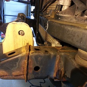 the wood spacer is farther back and has a L bracket supporting it now