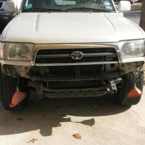 1997 4runner. Quick nose job to replace bumper brackets to straighten out the bumper and put new lower valance on.