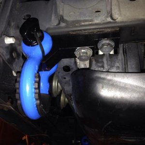 trackdecal.com shackle brackets. 3/4" D-Rings, Daystar Isolators, 11" zip ties and a little sky blue rattle-can paint.