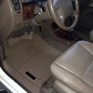 WeatherTech DigitalFit Floor LINERS. (http://www.weathertech.com/mobile/product-education-center/floorliner-digitalfit/). Their all-weather floor mats