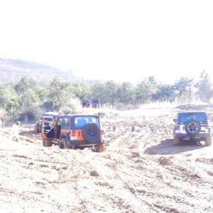 Jeeps pulling out Jeeps