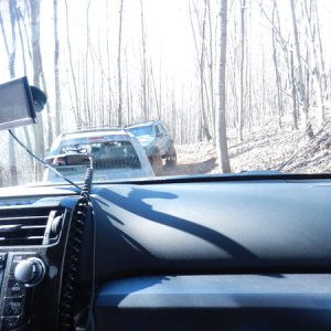 Got to the top of the muddy, slick, twisting trail up the hill in the woods and a jeep makes us turnaround and go back down...