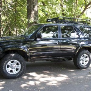 Took off my running boards and added a cargo basket.