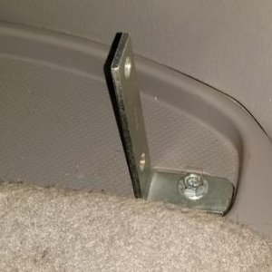 4 x 4 x 3/4 wide shelf angle from Lowes

I cut one leg to 1-1/2" to fit where the tie down hook mounts.