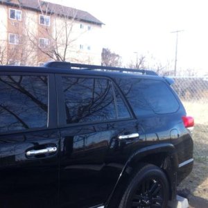 Wrapped the chrome roof rack in carbon fiber