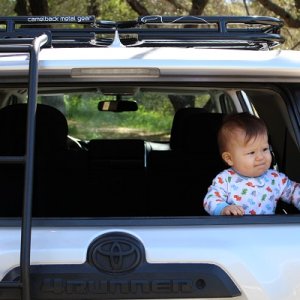 My son hanging out in the trunk area of the 4Runner.