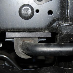 Sway bar relocation brackets
