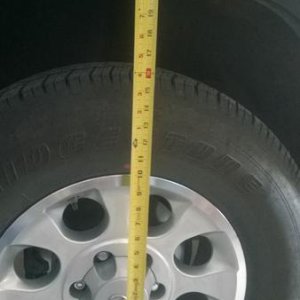 Rear wheel well spacing - pre-lift