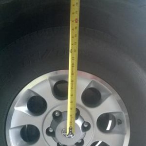 Front wheel well spacing - pre-lift
