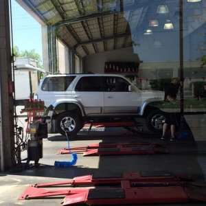 At the tire shop getting the new wheels and rubber installed