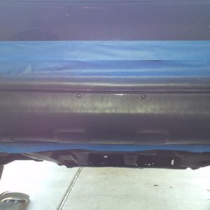 Front bumper trim getting sprayed