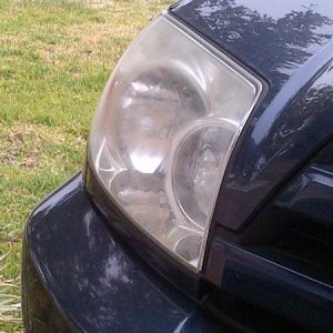 Right dulled/oxidized headlight cover