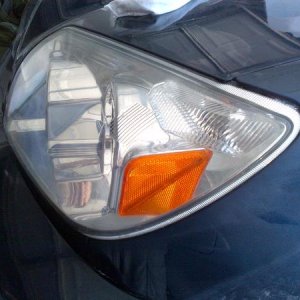 Polished up left hand light cover