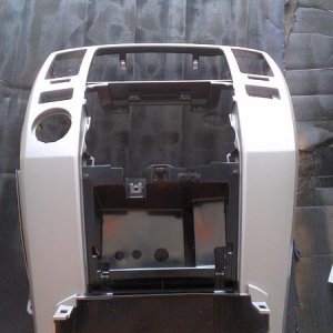 Center dash trim piece out for a repaint.