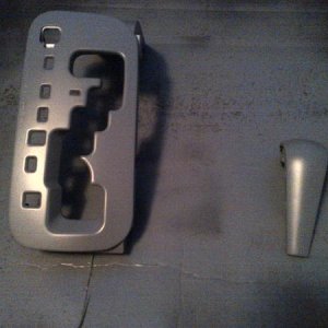 Shifter surround and shift knob trim primed