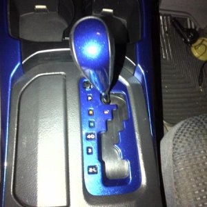 Shift knob trim installed back on knob and screwed back on