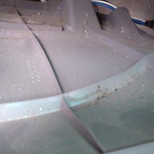 Behind the knee trim panel...ashes and nastiness.
