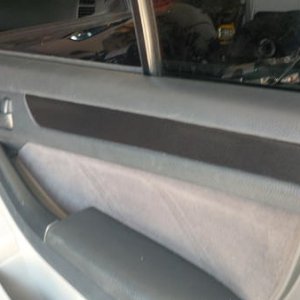 Door trim wrapped in Black Brushed Steel