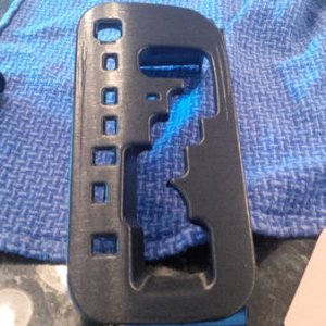 Shifter bezel and shift knob trim wrapped