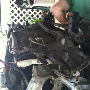 This one shows my dad trying to finish taking bolts out the bottom